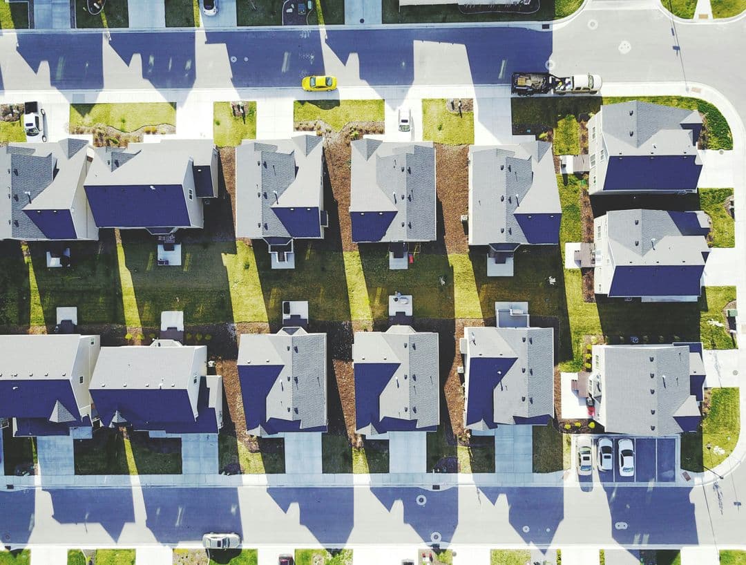 Aerial view of a suburban single-family home neighborhood